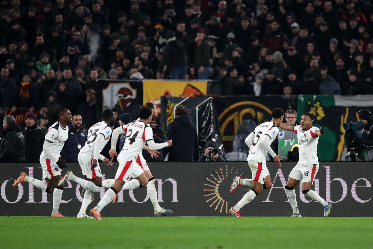 ROME, ITALY - JANUARY 25: Koni De Winter of AC Milan celebrates with teammates after scoring his team's first goal during the Serie A match between AS Roma and AC Milan at Stadio Olimpico on January 25, 2026 in Rome, Italy. (Photo by Paolo Bruno/Getty Images)