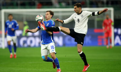 MILAN, ITALY - MARCH 20: Nicolo Barella of Italy battles for possession with Leon Goretzka of Germany during the UEFA Nations League quarterfinal leg one match between Italy and Germany at Stadio San Siro on March 20, 2025 in Milan, Italy. (Photo by Alex Grimm/Getty Images)