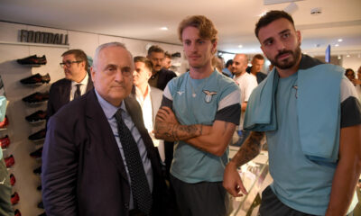 ROME, ITALY - OCTOBER 09: Nicolò Rovella, Mario Gila and Claudio Lotito attend the the SS Lazio new store unveiling on October 09, 2025 in Rome, Italy. (Photo by Marco Rosi - SS Lazio/Getty Images)