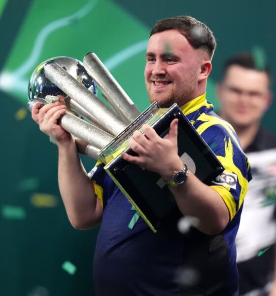 Luke Littler writes name among darts greats with stunning World Championship win over Gian van Veen