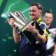 Luke Littler writes name among darts greats with stunning World Championship win over Gian van Veen