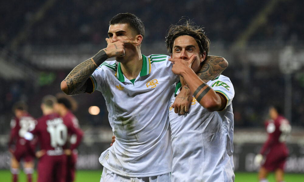 TURIN, ITALY - JANUARY 18: Paulo Dybala of AS Roma celebrates a goal with team mate Gianluca Mancini during the Serie A match between Torino FC and AS Roma at Stadio Olimpico di Torino on January 18, 2026 in Turin, Italy. (Photo by Valerio Pennicino/Getty Images)
