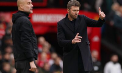 Pep Guardiola and Michael Carrick