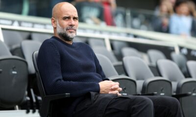 Pep Guardiola looks on ahead of Fulham vs Man City last season