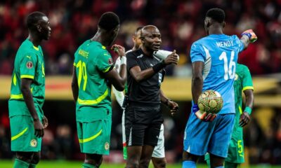AFCON final ends in CHAOS as Senegal players walk off pitch in protest after controversial late Morocco penalty decision
