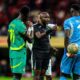 AFCON final ends in CHAOS as Senegal players walk off pitch in protest after controversial late Morocco penalty decision