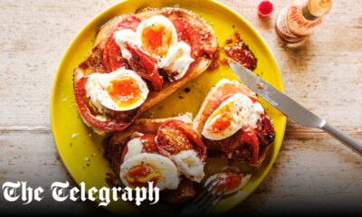 Big toast with roast tomatoes, jammy eggs, mayo and hot sauce