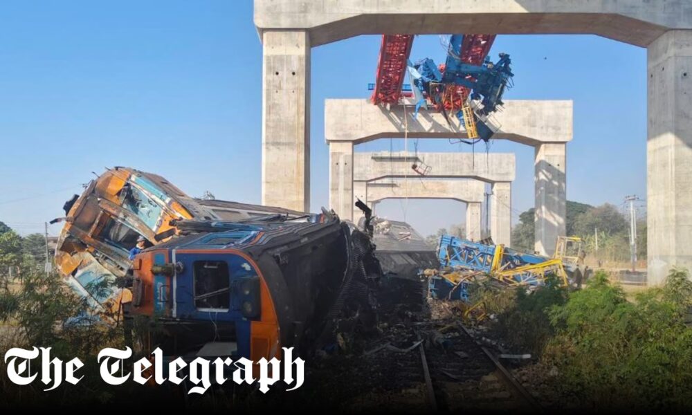 Crane collapses on to moving train in Thailand