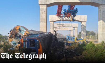 Crane collapses on to moving train in Thailand