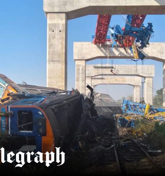 Crane collapses on to moving train in Thailand