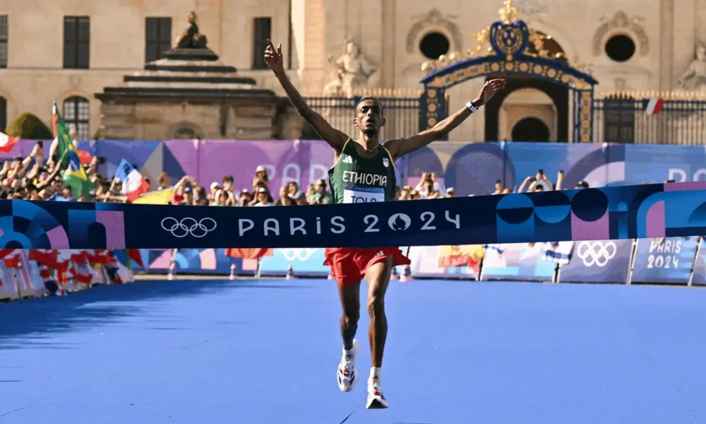 Tamirat Tola and Tigist Girma headline Doha Marathon by Ooredoo