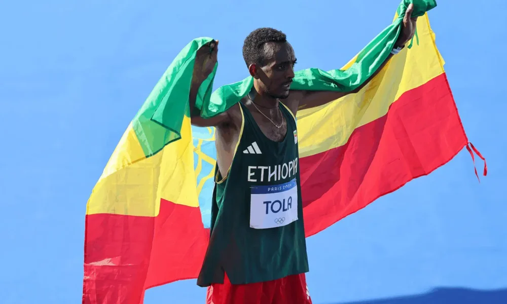 Tamirat Tola wins Doha Marathon by Ooredoo in new course record