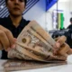 Thailand lifts cap on forex repatriation to temper baht rally