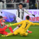 TURIN, ITALY - JANUARY 12: Weston McKennie of Juventus FC is challenged by Emil Audero Mulyadi of US Cremonese during the Serie A match between Juventus FC and US Cremonese at Allianz Stadium on January 12, 2026 in Turin, Italy. (Photo by Valerio Pennicino/Getty Images)