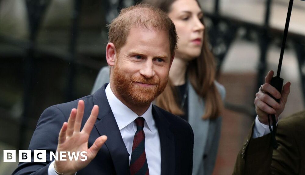 Prince Harry says Mail publisher made his wife Meghan's 'life a misery'