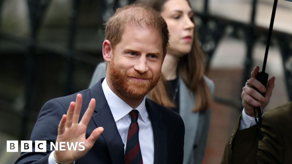 Prince Harry says Mail publisher made his wife Meghan's 'life a misery'