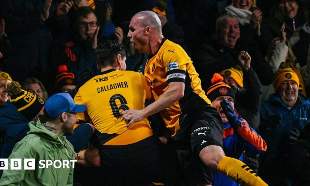 Carrick celebrate Luke McCulllough's goal