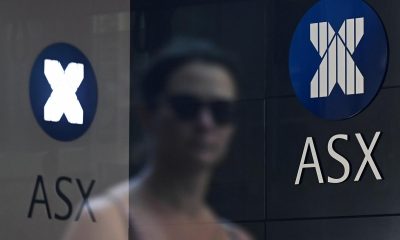 Aussie shares end week down after rollercoaster trading