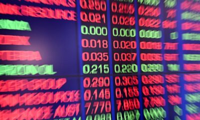 Banks lead Australian shares lower but miners lift