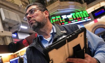 Wall Street ends higher, banks gain following results