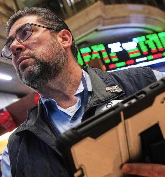 Wall Street ends higher, banks gain following results