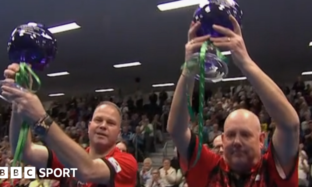 Paul Foster and Alex Marshall with their trophies