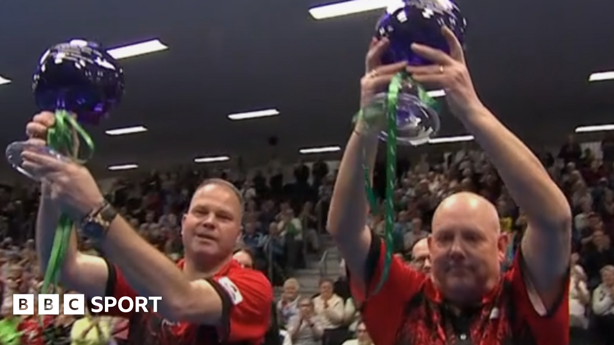 Paul Foster and Alex Marshall with their trophies