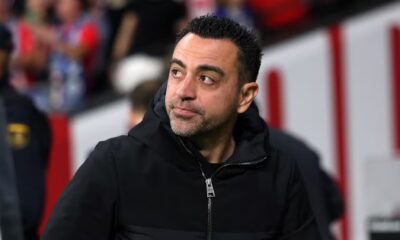 Barcelona head coach Xavi looks on from the touchline