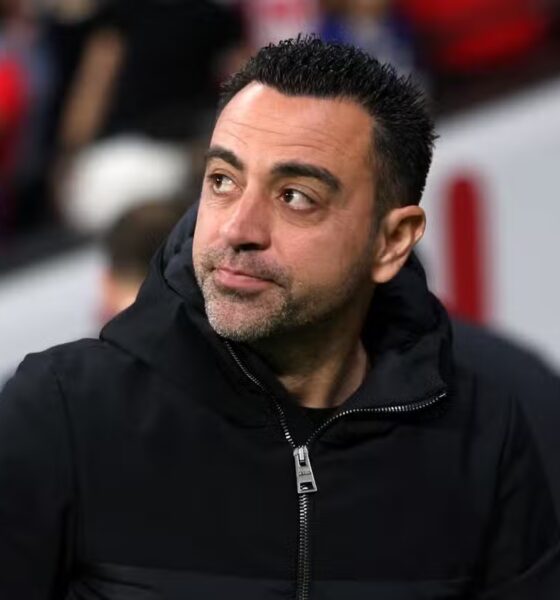 Barcelona head coach Xavi looks on from the touchline