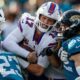 Buffalo Bills quarterback Josh Allen is tackled against the Jacksonville Jaguars