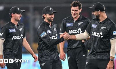 New Zealand players celebrate after winning the third one-day international against India to clinch the series