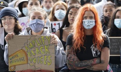 Protesters look on during a Black Lives Matter protest at the Senedd on June 06, 2020 in Cardiff, United Kingdom.