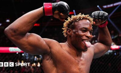 Ateba Gautier celebrates after a win in the UFC