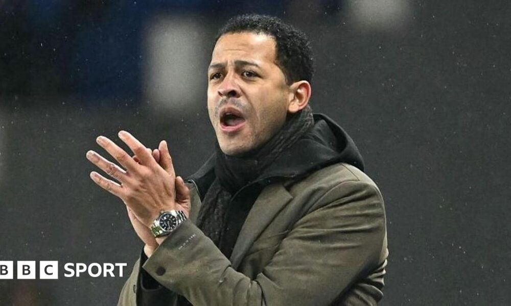 Ruud Gullit posing with the 1997 FA Cup trophy