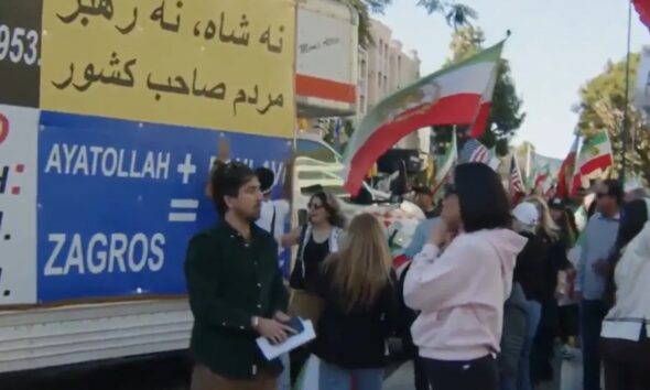 Moment truck ploughs into crowd of Iranian protesters in LA before cops drag driver away