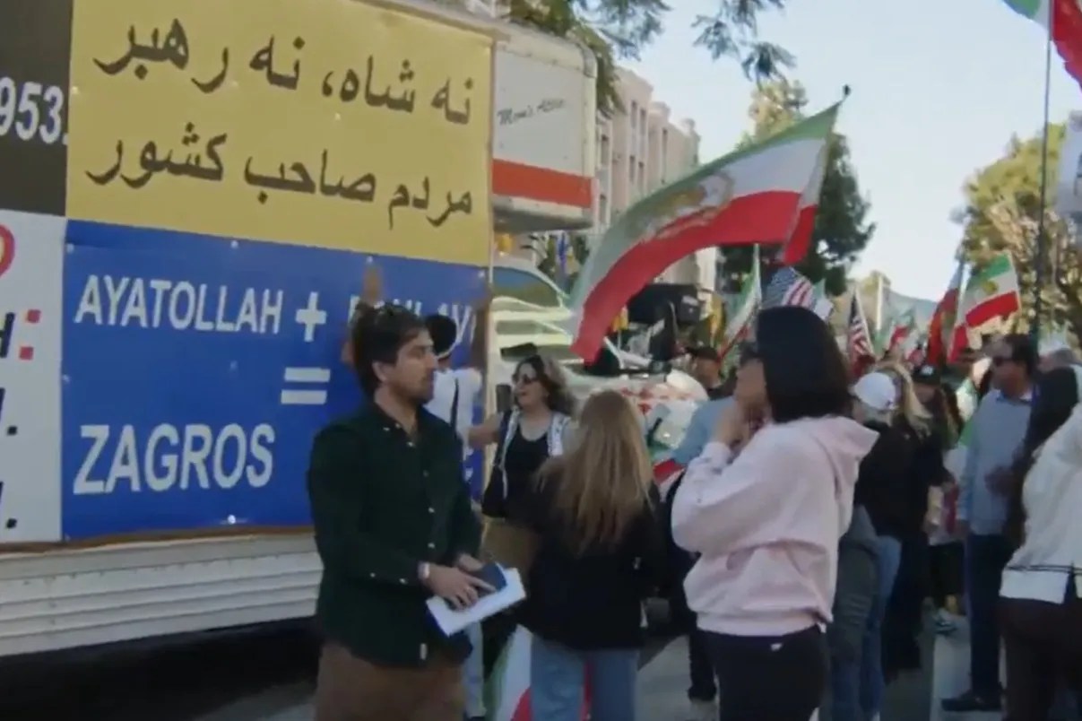 Moment truck ploughs into crowd of Iranian protesters in LA before cops drag driver away