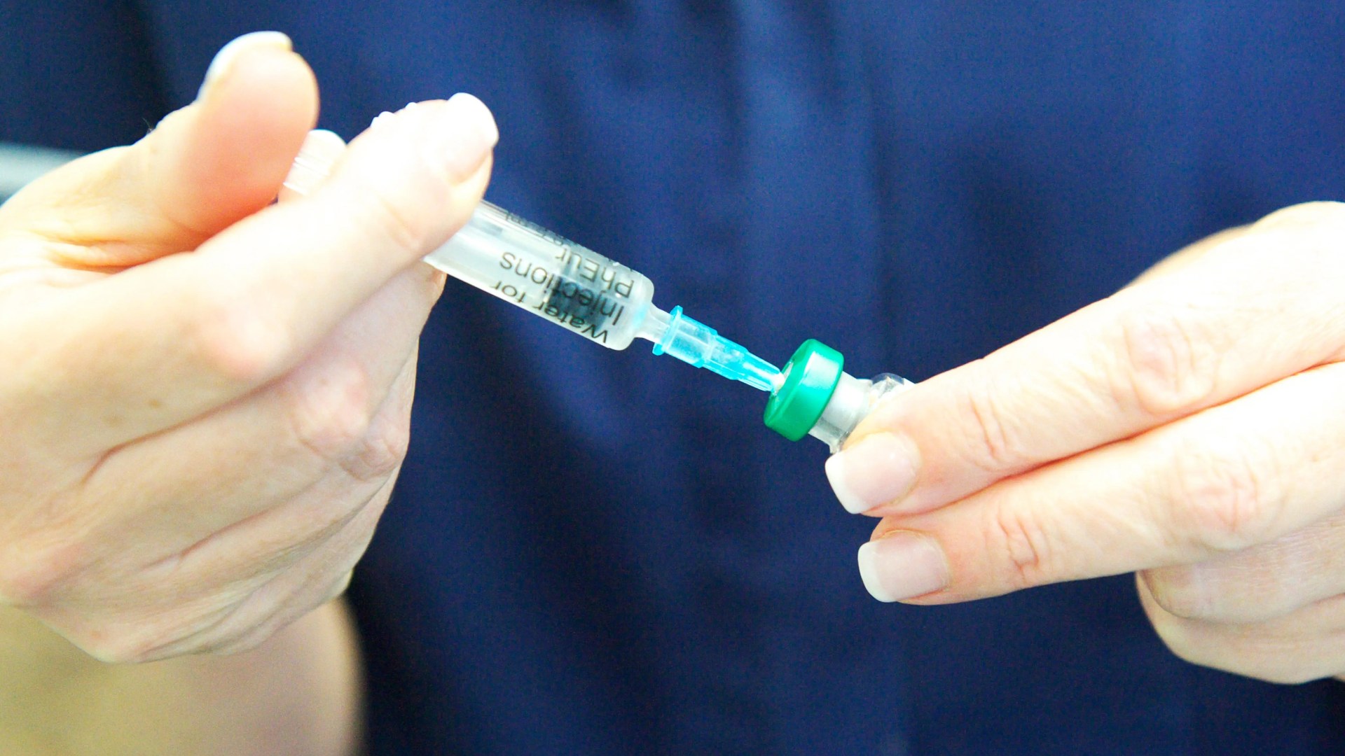 Can I have a flu jab with a cold?