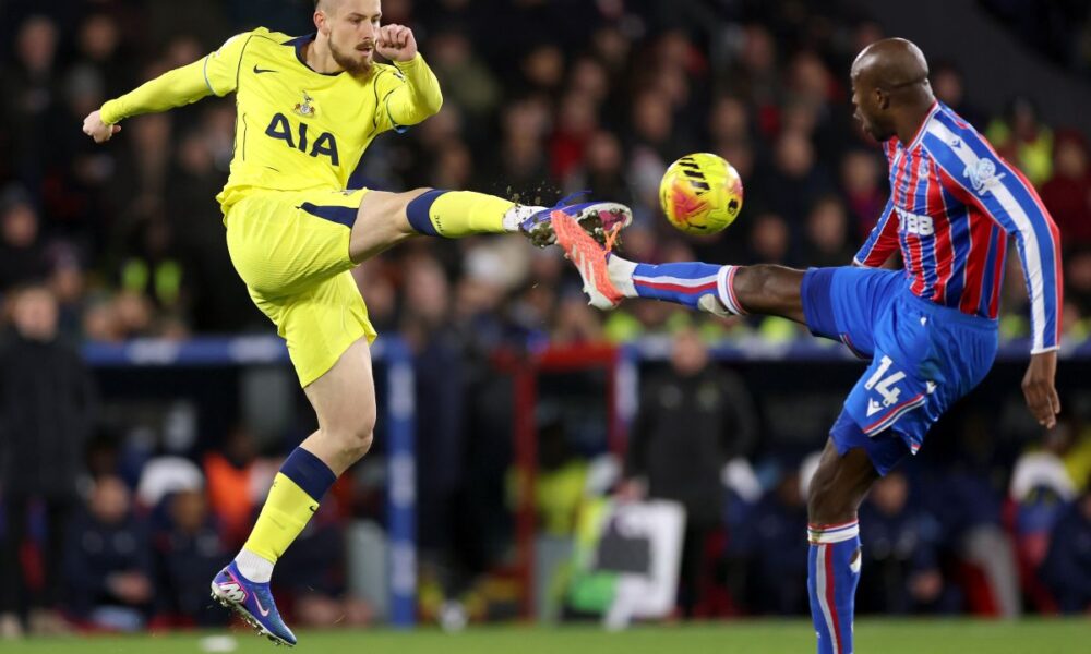 LONDON, ENGLAND - DECEMBER 28: Radu Dragusin of Tottenham Hotspur is put under pressure by Jean-Philippe Mateta of Crystal Palace during the Premier League match between Crystal Palace and Tottenham Hotspur at Selhurst Park on December 28, 2025 in London, England. (Photo by Julian Finney/Getty Images)