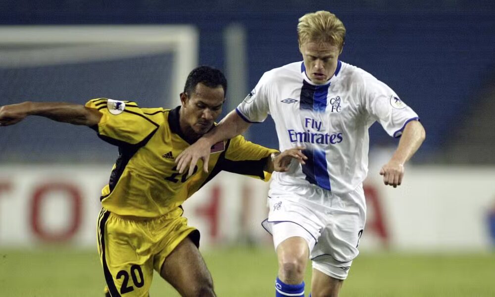 Damien Duff, pictured on the right, in action for Chelsea against Malaysia