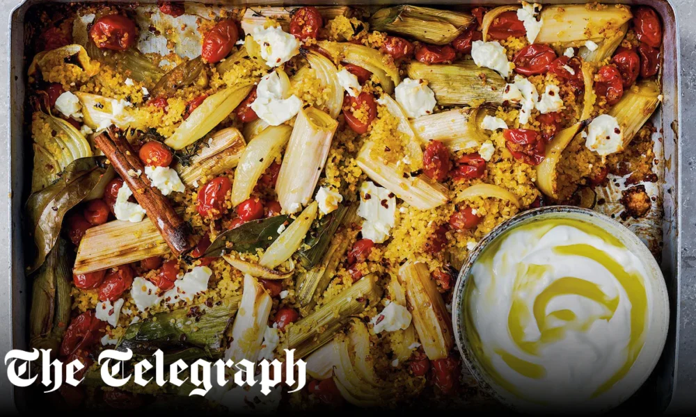 Baked leeks, tomatoes, bulgur wheat and feta with garlic yoghurt