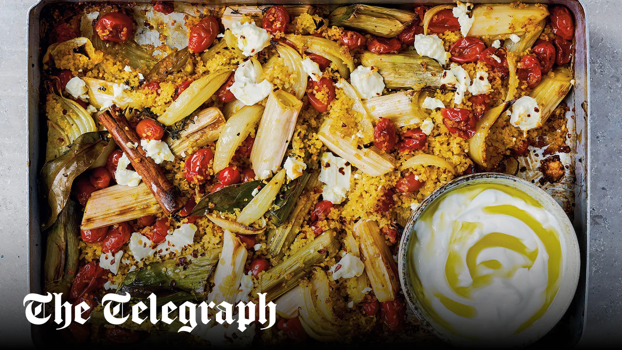 Baked leeks, tomatoes, bulgur wheat and feta with garlic yoghurt
