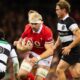 Wales' Aaron Wainwright runs with the ball against the Barbarians