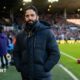 Manchester United head coach Ruben Amorim in a dark winter coat on the touchline before the 1-1 draw with Leeds