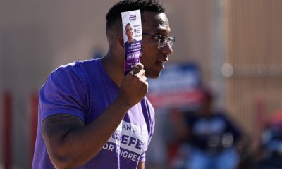 Democratic 18th Congressional District candidate Christian Menefee greets voters near a polling place on Nov. 4, 2025, in Houston.