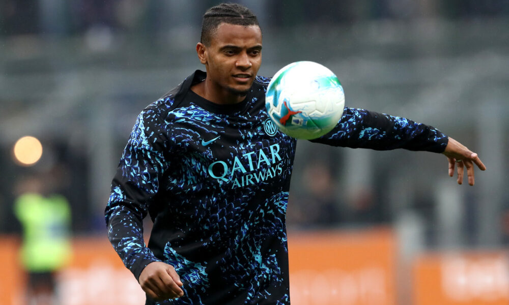 MILAN, ITALY - OCTOBER 04: Manuel Akanji of Internazionale warms up prior to the Serie A match between FC Internazionale and US Cremonese at Giuseppe Meazza Stadium on October 04, 2025 in Milan, Italy. (Photo by Marco Luzzani/Getty Images)