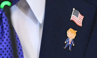 Trump unveils 'Happy Trump' pin, sparks online frenzy amid other collectibles
