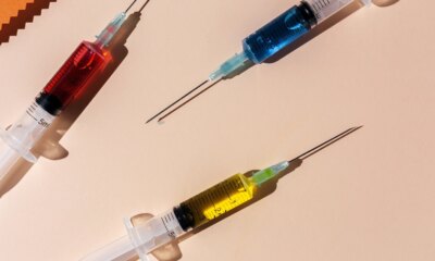 Covid-19- Vaccine vial dose against coronavirus needle syringe, medical concept vaccination