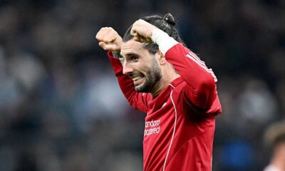 Dominik Szoboszlai of Liverpool celebrates after teammate Cody Gakpo (not pictured) scores his team's third goal during the UEFA Champions League 2025/26 League Phase MD7 match between Olympique de Marseille and Liverpool FC at Stade de Marseille on January 21, 2026 in Marseille, France.