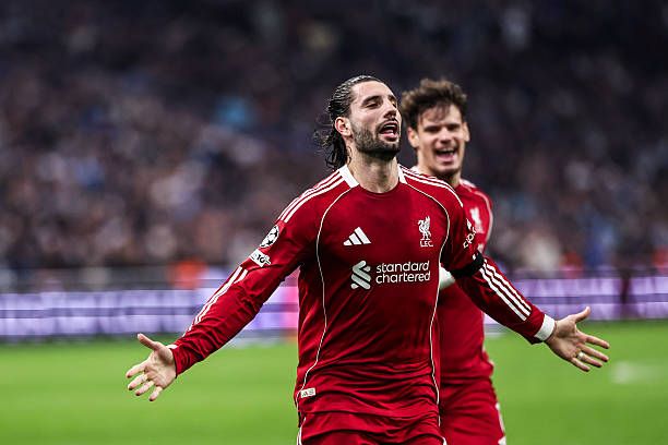 Dominik Szoboszlai celebrates his freekick for Liverpool