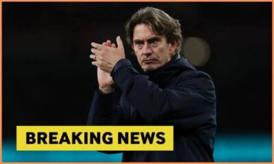 Tottenham manager Thomas Frank applauding fans with overlay of Breaking News